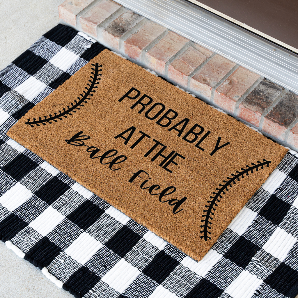 Probably at the Ball Field Doormat
